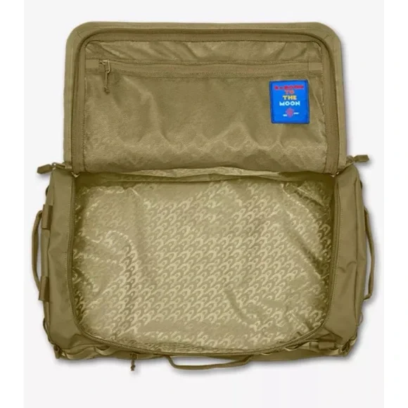 BABOON TO THE MOONGo small woven duffle bag in Crocodile/ excellent